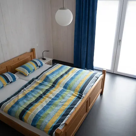 Gaestewohnung In Massivholzhaus